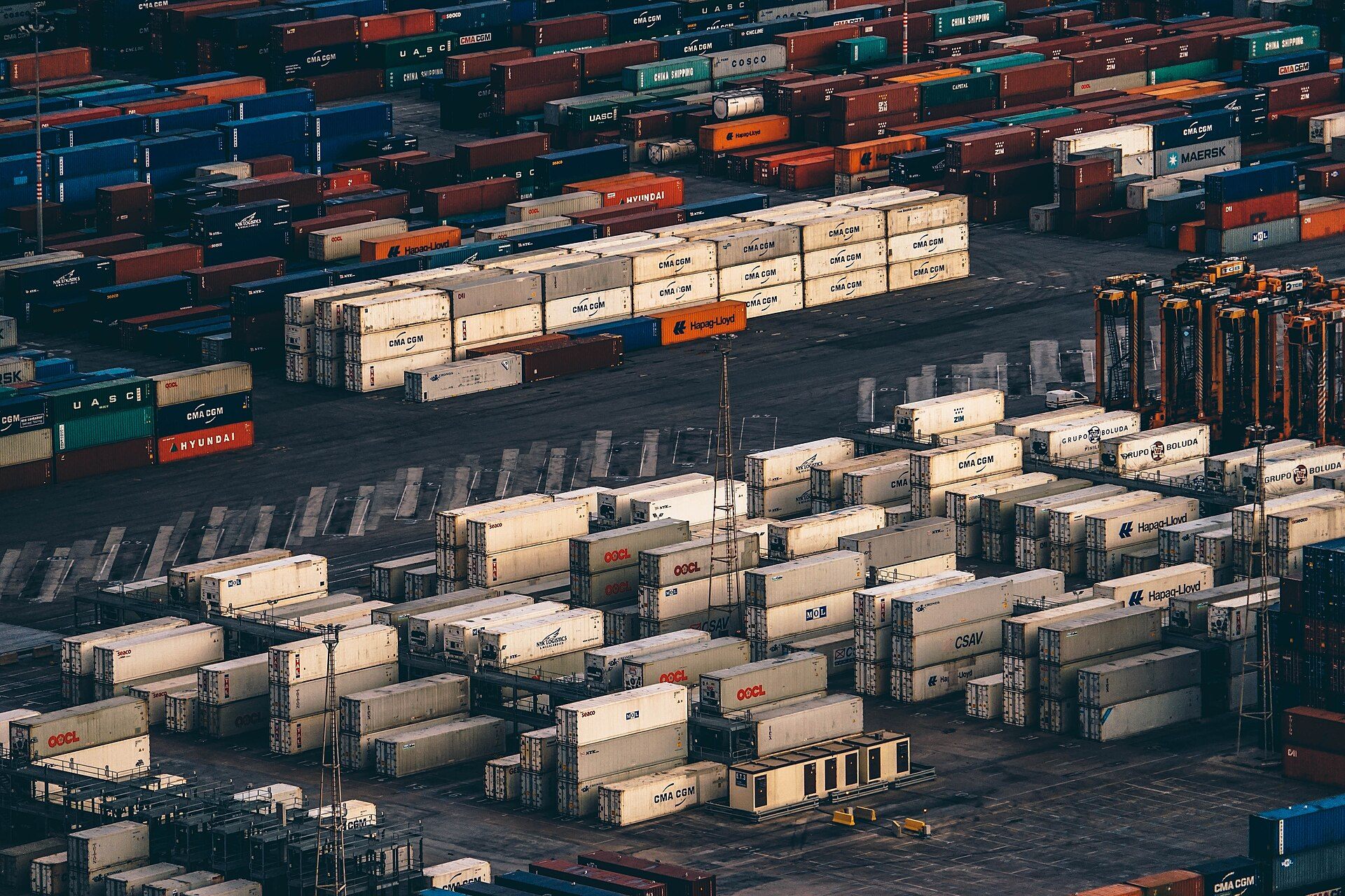 Shipping containers at the Port of Barcelona, illustrating international supply-chain research.